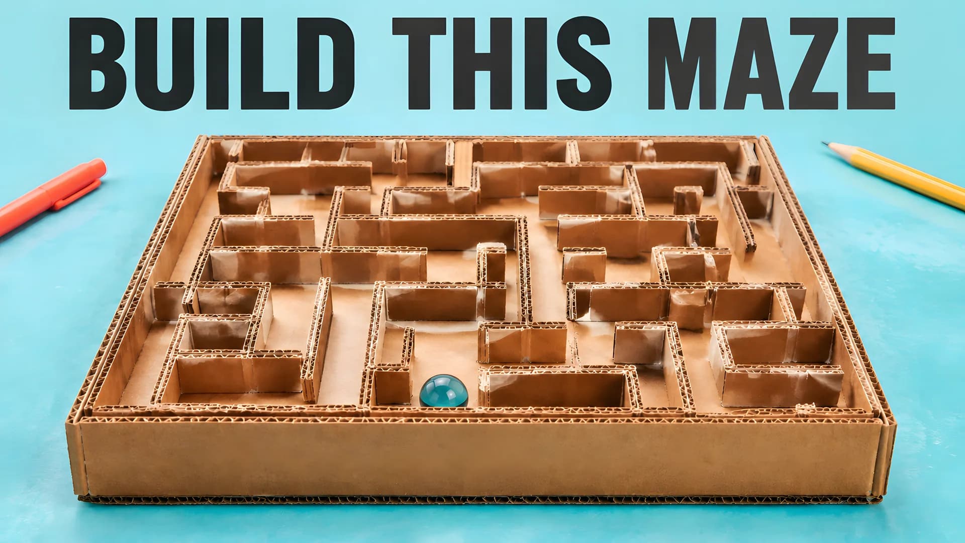 Illustration of a cardboard marble maze on an aqua worktable, headed Build This Maze.
